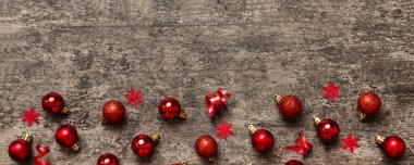 Christmas composition. a pattern of christmas balls on colored background. Flat lay, top view New year decor.