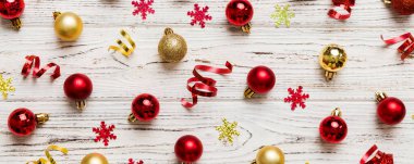 Christmas composition. a pattern of christmas balls on colored background. Flat lay, top view New year decor.