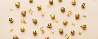 Christmas composition. a pattern of christmas balls on colored background. Flat lay, top view New year decor.