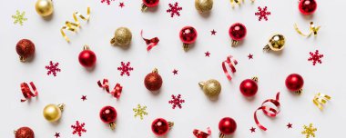 Christmas composition. a pattern of christmas balls on colored background. Flat lay, top view New year decor.