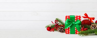 New Year Christmas tree toy, branches of a christmas tree, New Year decorations on a colored background.