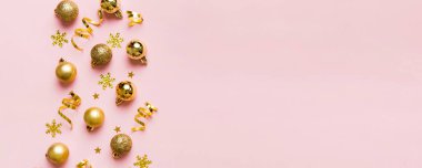 Christmas composition. a pattern of christmas balls on colored background. Flat lay, top view New year decor.