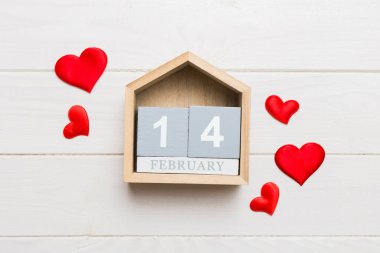 Valentine Day theme with wooden block calendar. Greeting card template for Valentines Day.copy space for text.