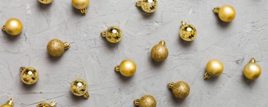 Christmas composition. a pattern of christmas balls on colored background. Flat lay, top view New year decor.