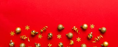 Christmas composition. a pattern of christmas balls on colored background. Flat lay, top view New year decor.