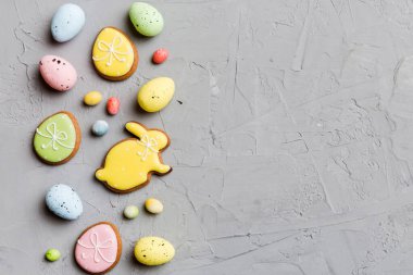 Happy Easter concept. Preparation for holiday. Easter eggs on colored background. flat lay top view copy space banner.