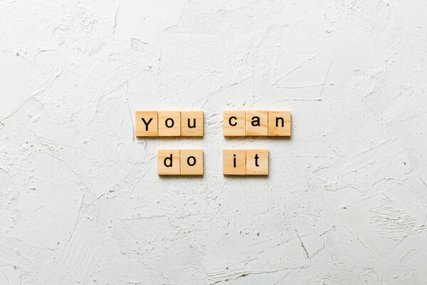 training word written on wood block. training text on table, concept.