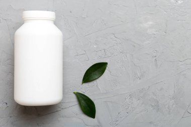 İlaçlar, ilaç şişesi, sağlık ve tıbbi destek. Vitamin hapları. Yeşil yapraklı vitaminler, doğal organik biyo takviyeler, fotokopi alanı..