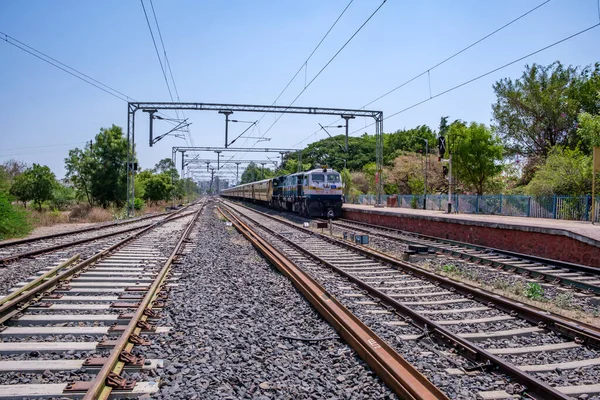 stock image Baramati, India - May 20 2023: A passenger train hauled by a WDP4D class diesel locomotive at Baramati India.