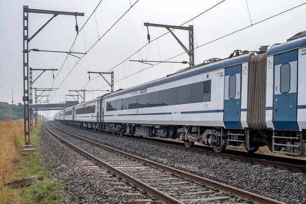 stock image Pune, India - November 05 2023: The Solapur Mumbai Vande Bharat Express Train heading towards Mumbai, near Pune India.