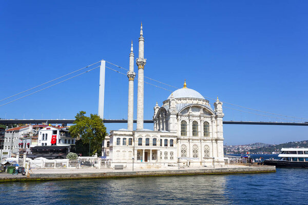 ISTANBUL, TURKEY 2023 August 05: The beautiful exterior of the Ortakoy Mosque in Istanbul, Turkiye