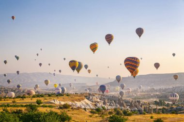 The balloon flight, the great tourist attraction of Cappadocia. Cappadocia is known worldwide as the best place to fly with hot air balloons clipart