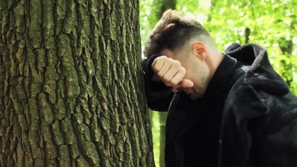 Close Upset Male Face Sad Stressed Man Standing Tree Wood — Stock Video