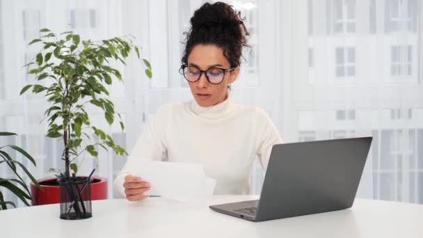 Latin Woman Glasses Sitting Table Making Pay Bills Using Laptop — Stock Video
