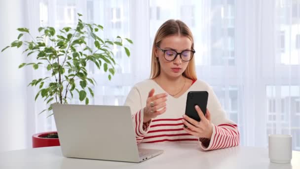 Stressed Nervous Young Woman Glasses Looking Cellphone Screen Feeling Frustrated — Stockvideo