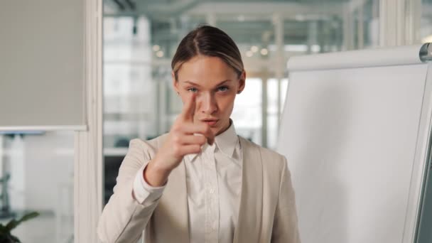 Serious Pretty Business Woman Shows Direction Forward Index Fingers Smiling — Video Stock