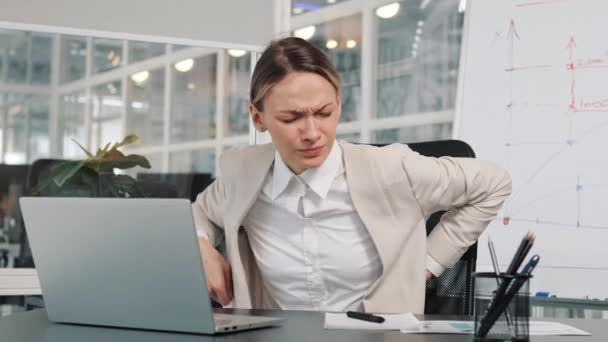Female Office Worker Boss Working Laptop While Feeling Strong Pain — ストック動画