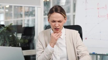 Young ill business woman touch cheek suffer from teeth ache. Office worker sick girl feel toothache dental pain sensitive bleeding gums oral cavity caries problem disease unwell illness