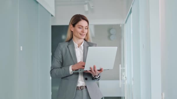 Beautiful Specialist Formal Grey Suit Standing Hallway Office Holding Laptop — Vídeos de Stock