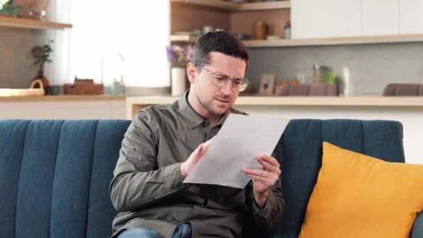 Upset Man Reading Document Loan Arrears Feeling Negative Emotions Angry — стоковое видео