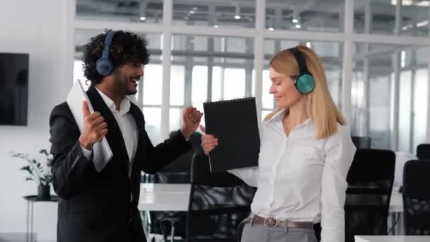 Group Diverse Joyful Individuals Wearing Wireless Headphones Dancing Having Fun — Stock Video