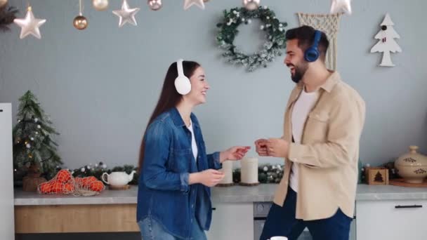 Ecstatic Couple Swaying Kitchen Festooned Holiday Lights Immersing Christmas New — Stock Video