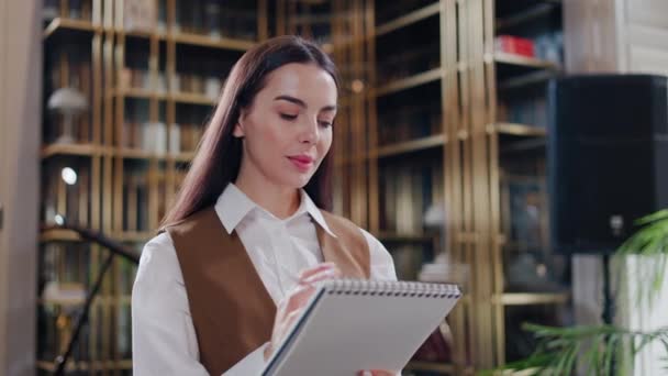 Graceful Pretty Businesswoman Taking Notes Notebook Upscale Restaurant Long Haired — Stock Video