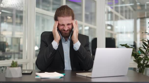 Frustrated Exhausted Businessman Touching Head Because Feeling Ache While Sitting — Stock Video