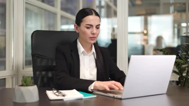 Female Office Worker Sitting Typing Modern Laptop Keyboard Feeling Headache — Stock Video