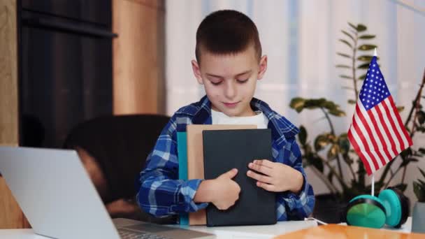 Friendly Caucasian Boy Casual Attire Embracing Books While Smiling Looking — Stock Video