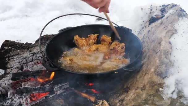 Close Caucasian Man Cooking Deep Fried Meat Metal Pot Wooden — Stock Video