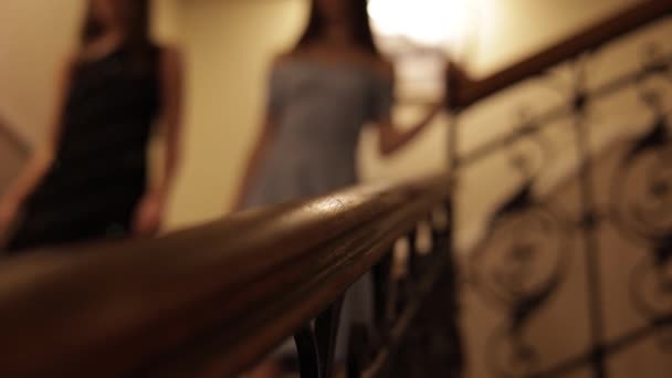 Blurred Background Two Young Women Elegant Dresses Going Flight Stairs — Stock Video