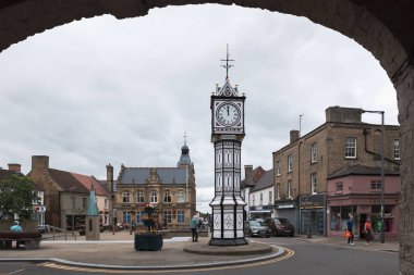 DOWNHAM MARKET, NORFOLK, UK, JULY 11. View of the Clocktower at Downham Market, Norfolk, UK on July 11, 2024. Unidentified people clipart