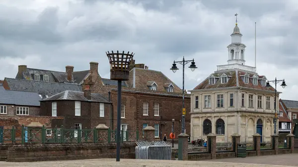 stock image KINGS LYNN, NORFOLK, UK, JULY 9. View of the Customs building in Kings Lynn, Norfolk, UK on July 09, 2024. Two unidentified people