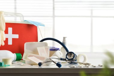 Basic cures service of medical center on table and background window. Horizontal composition. Front view. 