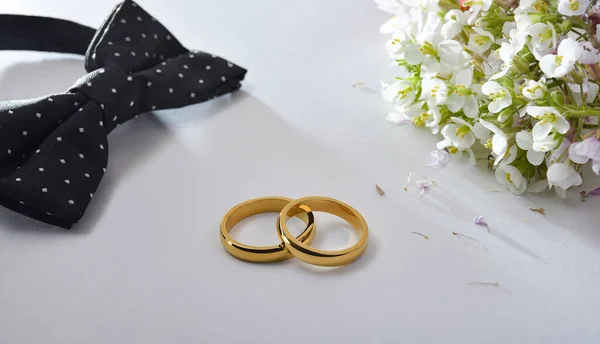 Wedding Concept Gold Rings Center White Table Black Bow Tie — Stock Photo, Image