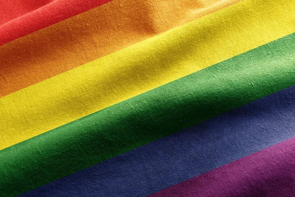 性別や性同一性の多様性の虹の旗の色とテクスチャ生地の詳細 トップ表示 — ストック写真