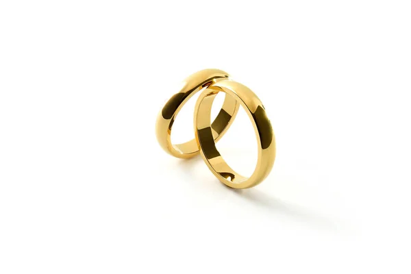 Detail Engagement Gold Rings Leaning Each Other White Isolated Background — Stock Photo, Image