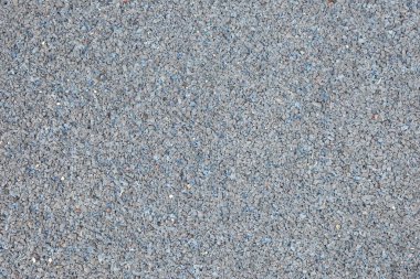 Açık hava çocuk oyun alanlarında yastık koymak için küçük parçalardan yapılmış küçük plastik fayansların ayrıntıları. Üst görünüm.