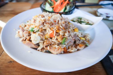 stir fried rice, fried rice with vegetable salad for serve