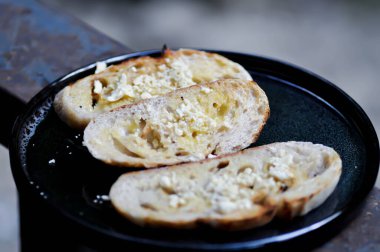 garlic bread, bread or sliced baguette or sliced bread or almond bread for serve