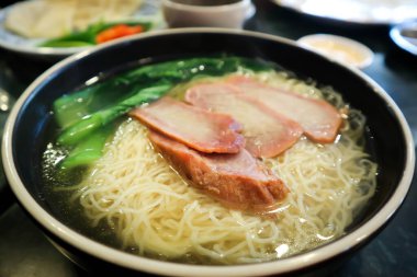 Chinese noodles, egg noodles or roasted pork noodles or Hongkong noodles