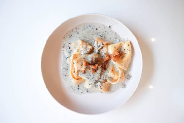 pasta or tortellini with guanciale , pasta carbonara for serve