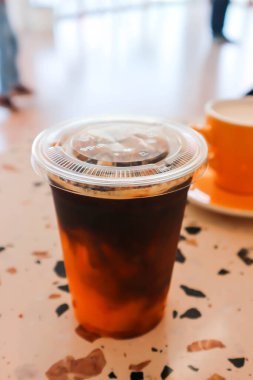 black orange coffee or orange juice and espresso or orange coffee for serve