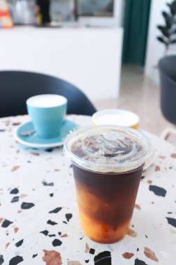 black orange coffee or orange juice and espresso or orange coffee and hot milk for serve