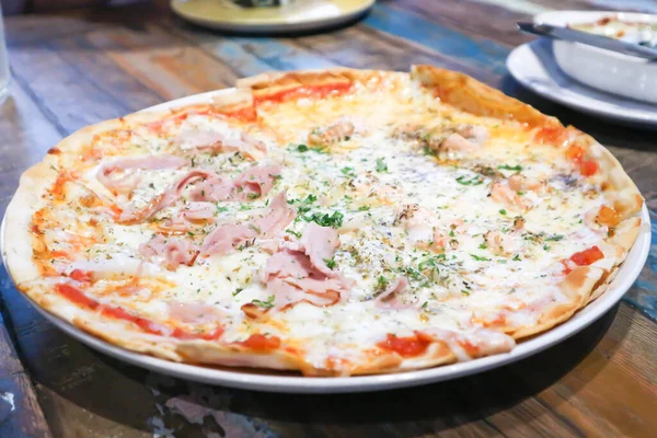 cheese pizza or Hawaiian pizza or Italian pizza ,ham pizza