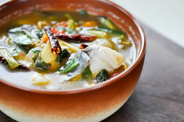 fish soup or spicy soup, spicy fish soup or sea bass soup with vegetable and chili