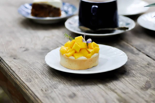 mango cake or mango cheese cake , mango cheese pie with mango topping