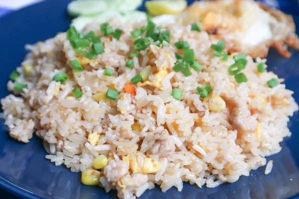 stir fried rice or fried rice with vegetable and sunny side up egg