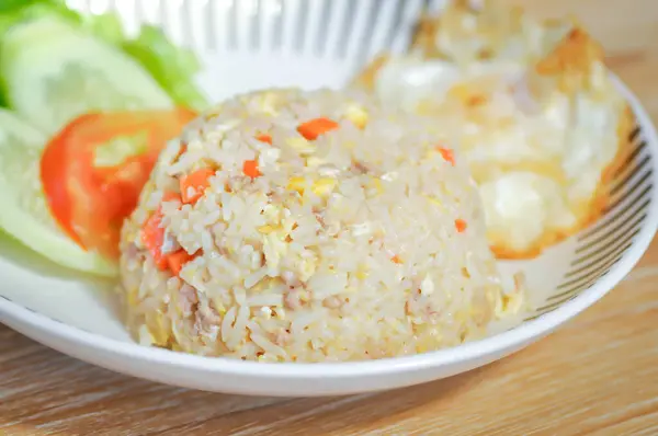 stir fried rice or fried rice with sunny side up egg or fried egg